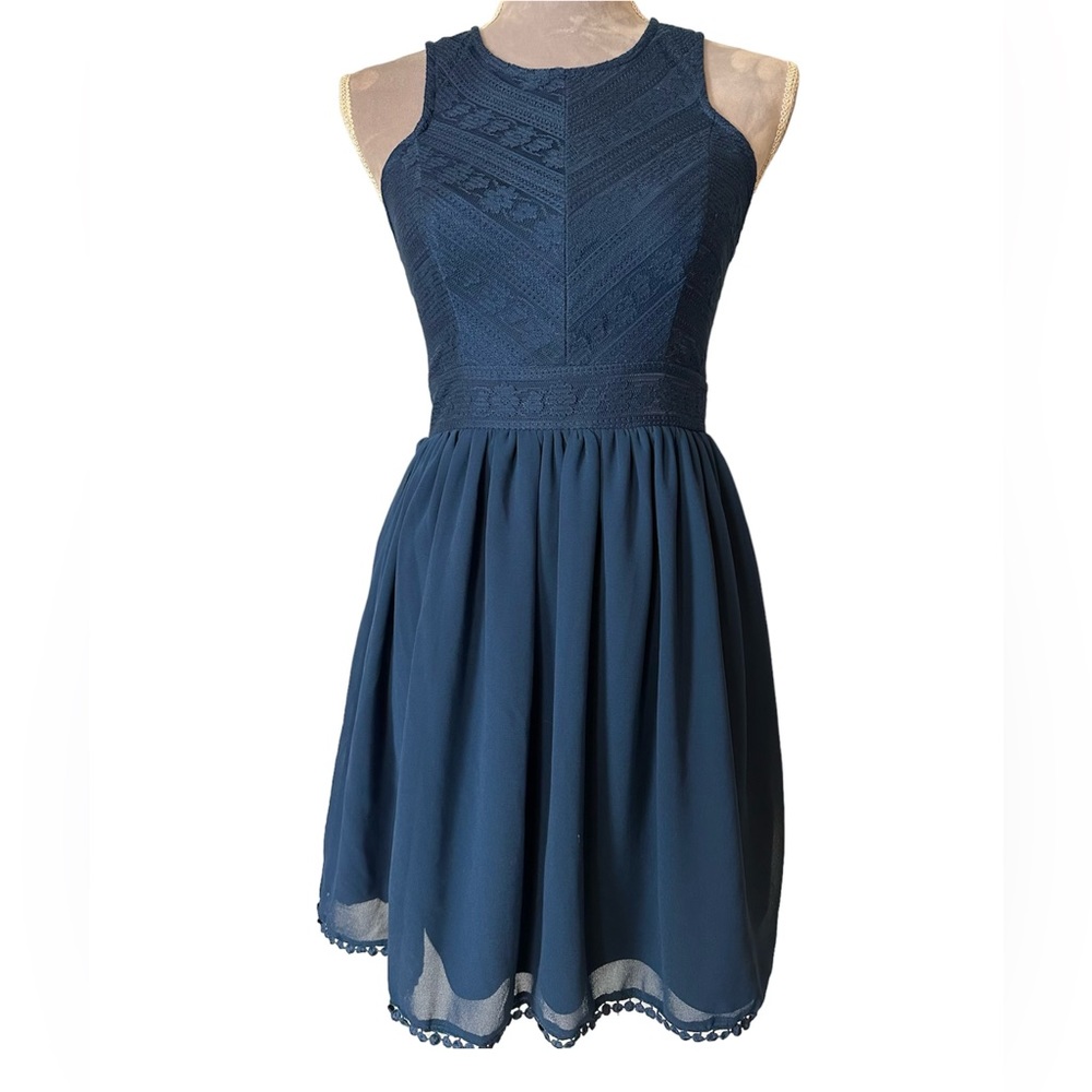 Francesca’s collections fit and flare mini dress with lace detail. size small